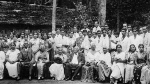 A black-and-white group photo of family celebrating a wedding anniversary