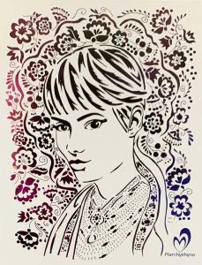 A black-and-white portrait of a Ukrainian woman, created using a paper-cutting technique.